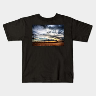 Sunset over wheat fields Kids T-Shirt